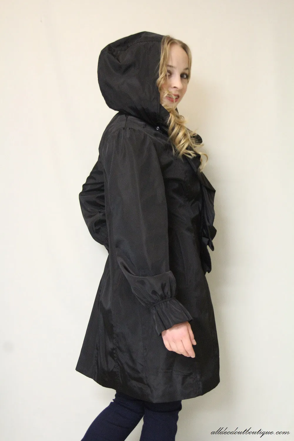 Firmiana | Black Zip Up Rain Jacket with Ruffles